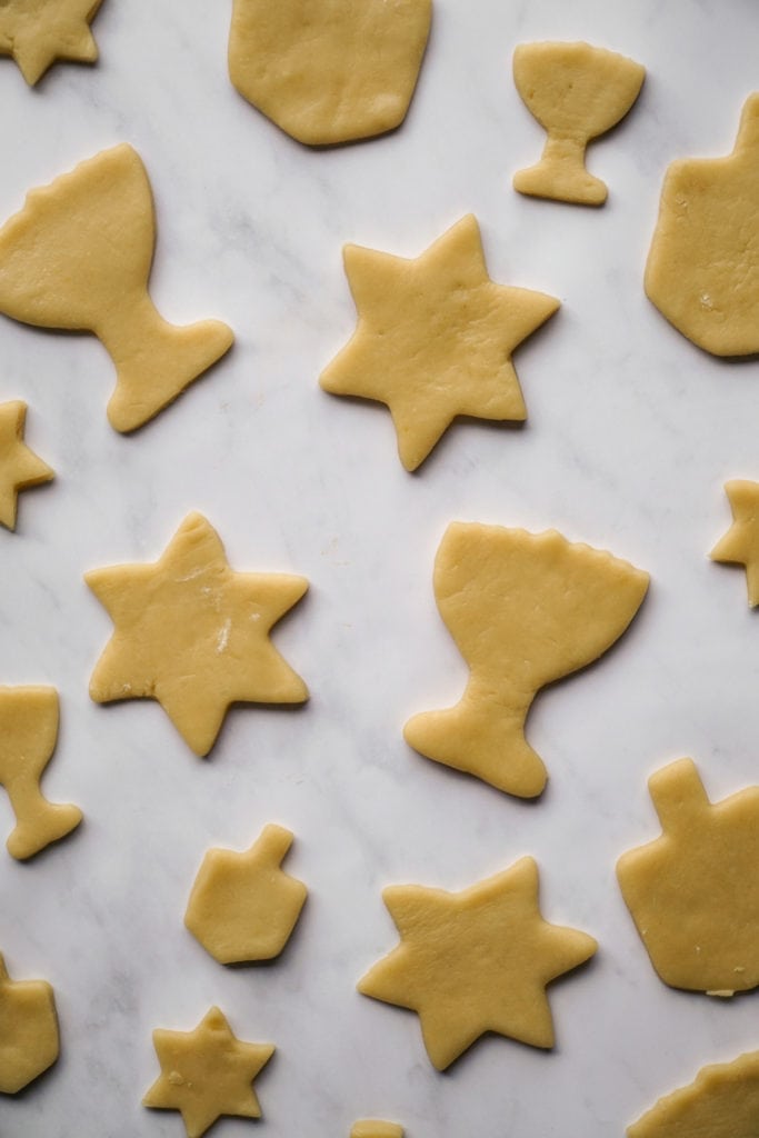 raw sugar cookies in Chanukah shapes